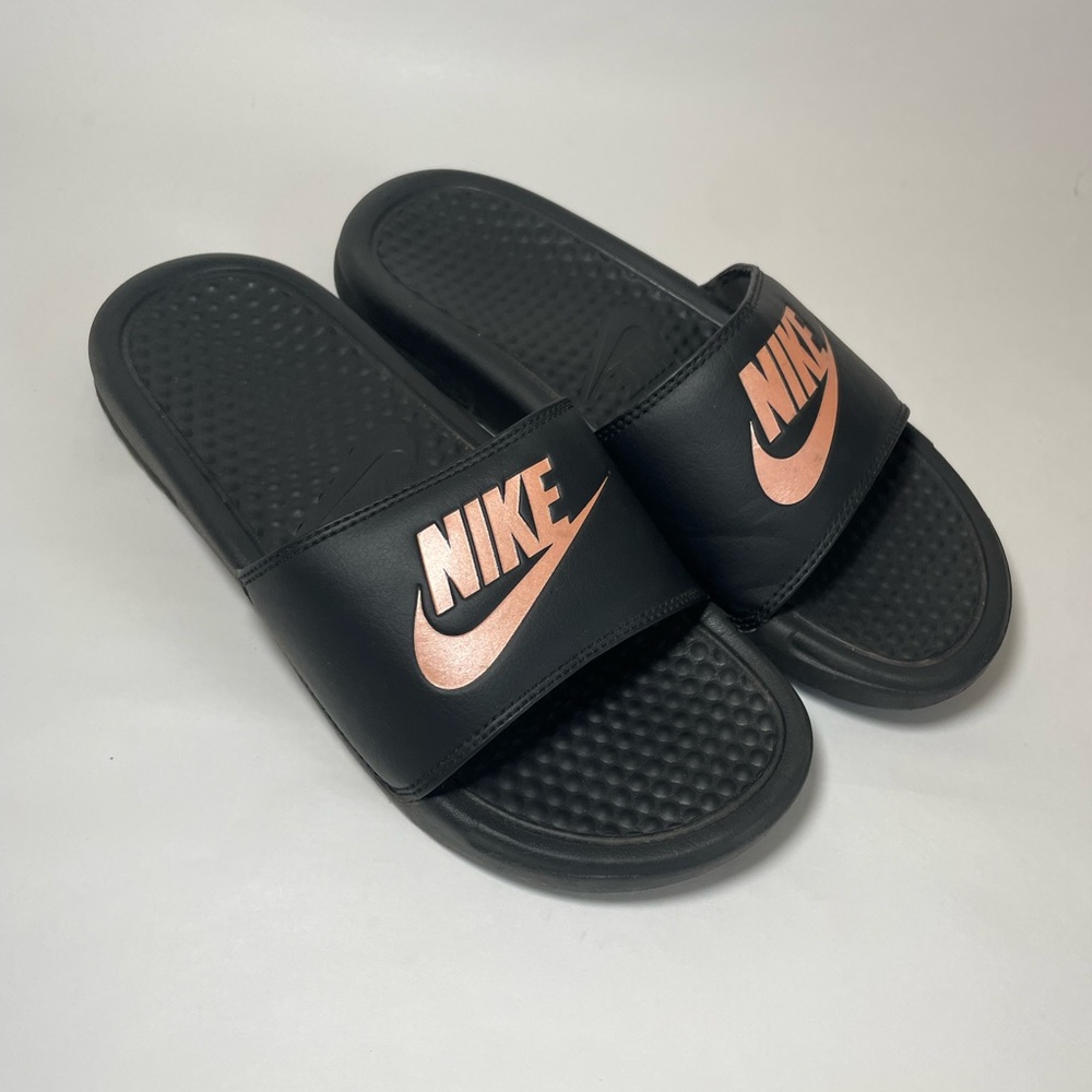 Nike Black Slides with Metallic Pink Logo